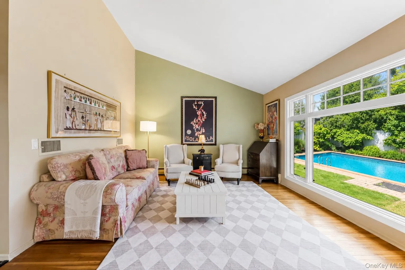 formal living room overlooking sparkling pool formal living room overlooking sparkling pool