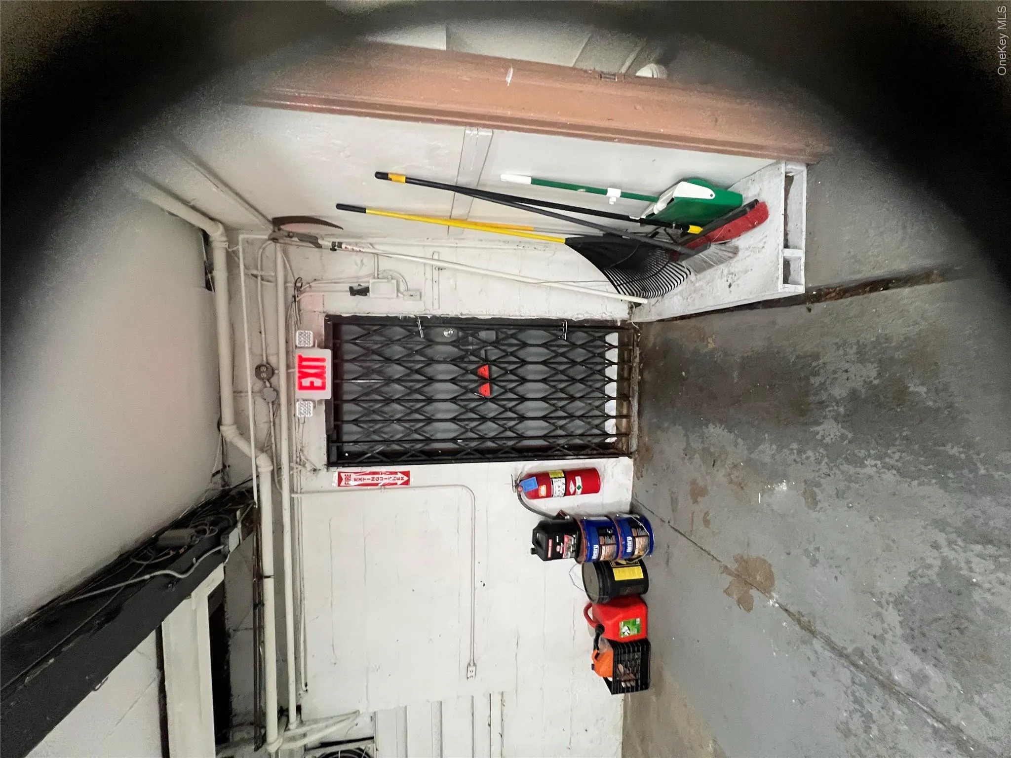 Exit Door to rear of building and parking lot. Exit Door to rear of building and parking lot.
