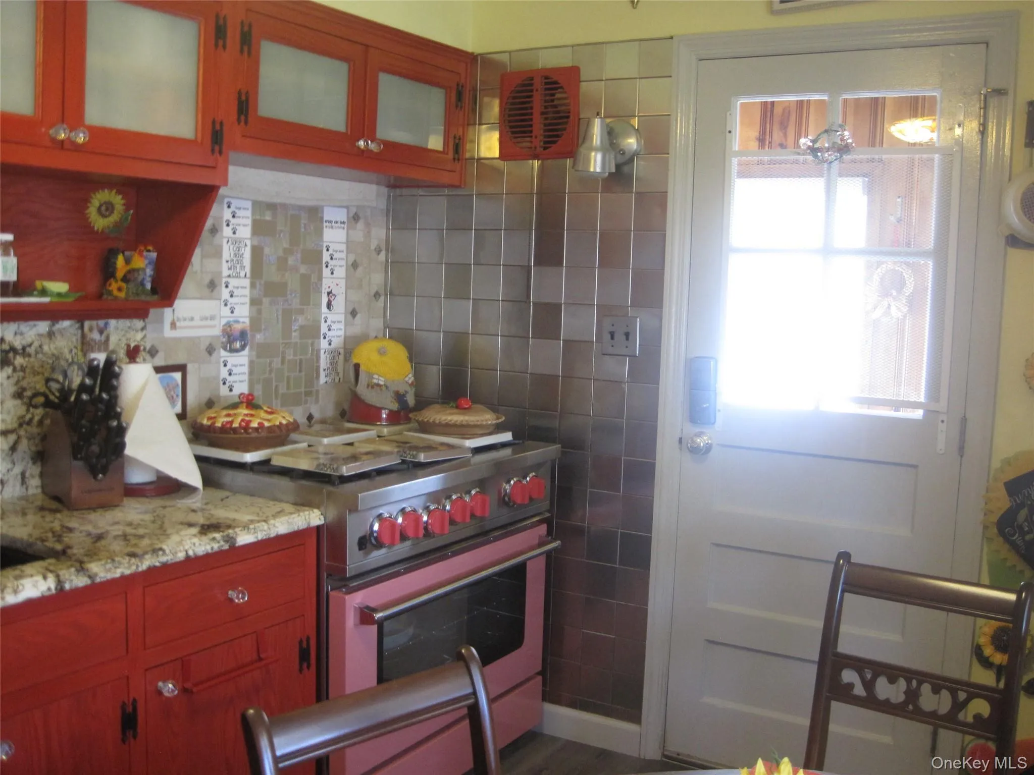 Kitchen With Tiles And 36" Gas Stove/Oven. To Outside Kitchen With Tiles And 36" Gas Stove/Oven. To Outside
