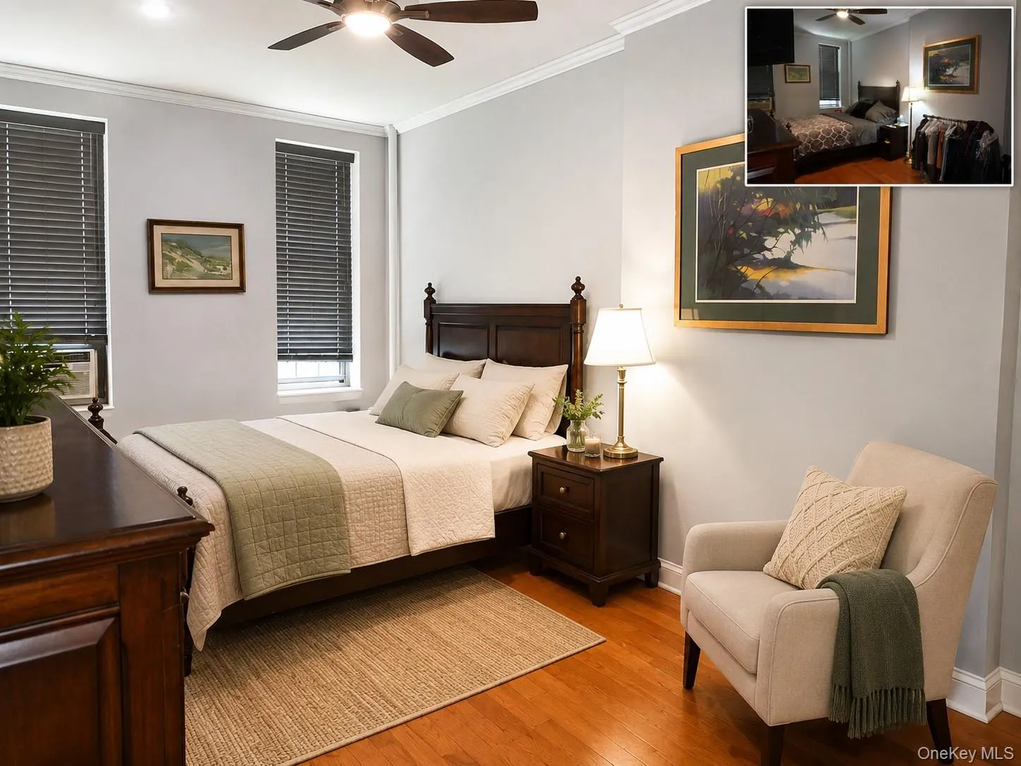 Hardwood flooring complements light gray walls with white crown molding(virtually staged) Hardwood flooring complements light gray walls with white crown molding(virtually staged)