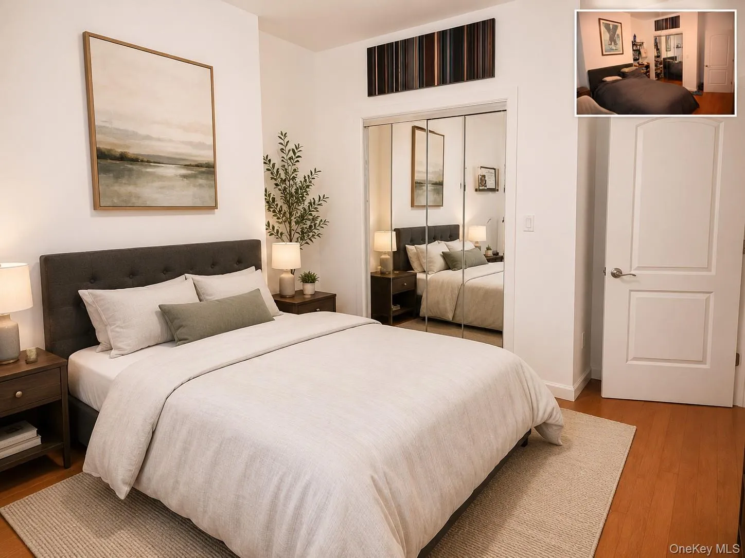 Bedroom featuring wood-finish flooring and a neutral color palette(virtually staged) Bedroom featuring wood-finish flooring and a neutral color palette(virtually staged)