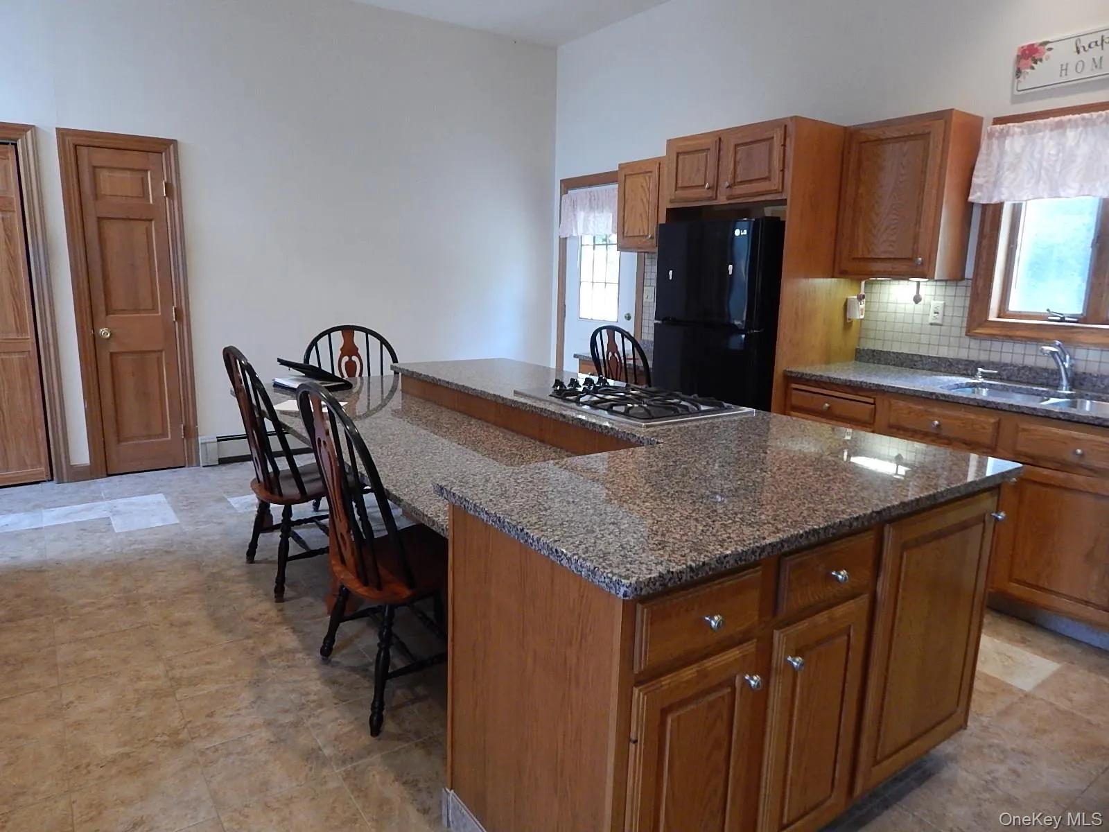 The kitchen has access to the deck. breakfast area and lots of storage. The kitchen has access to the deck. breakfast area and lots of storage.