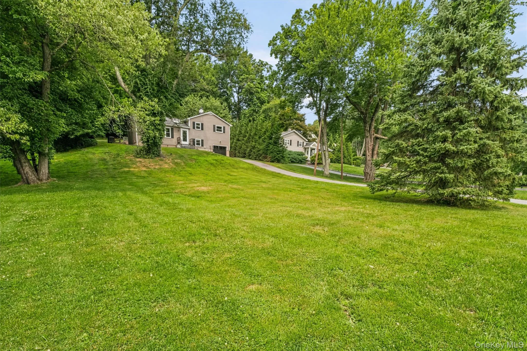 Half acre of lovely property - great front yard & back yard Half acre of lovely property - great front yard & back yard