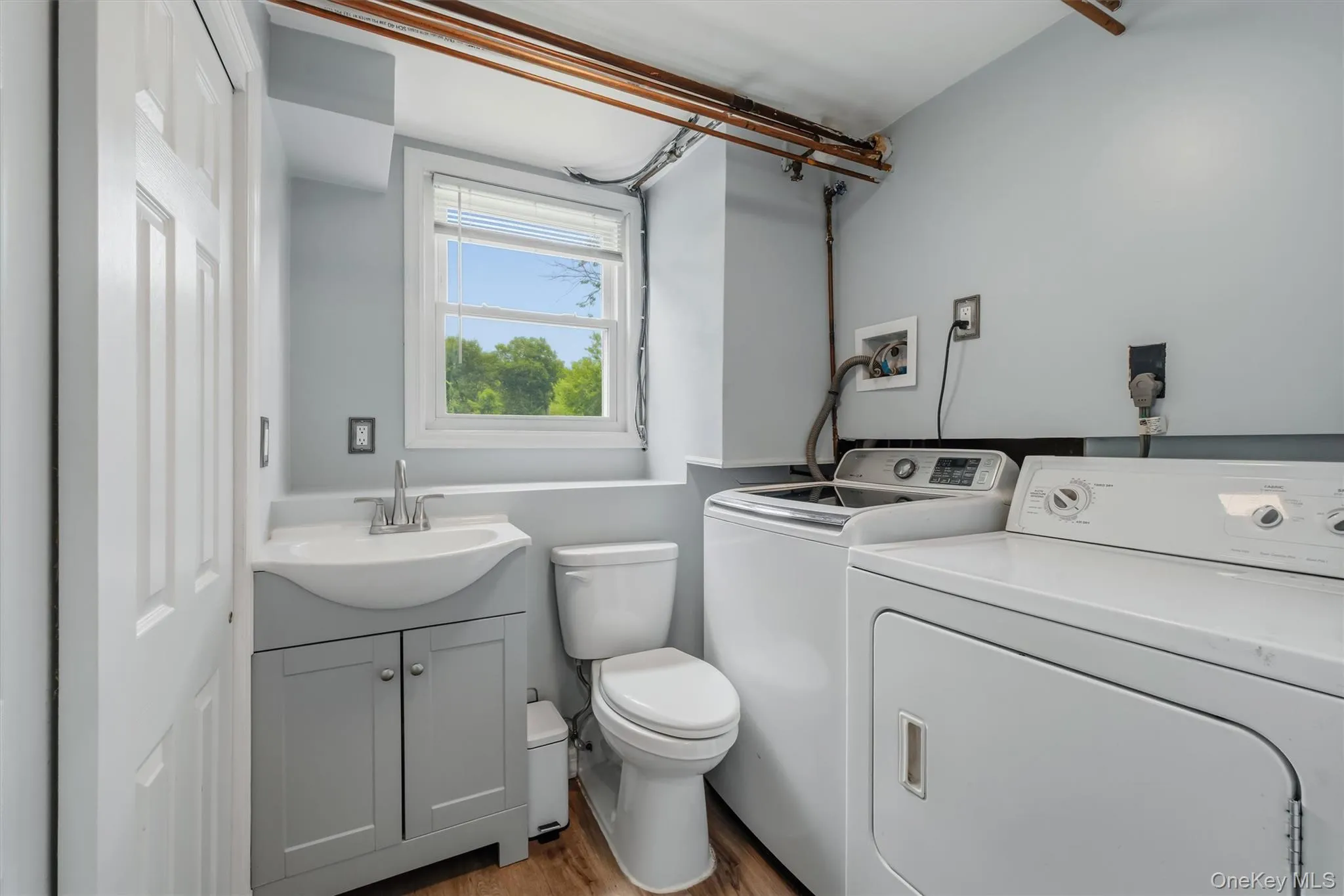 Updated Half Bath and Laundry Area Updated Half Bath and Laundry Area