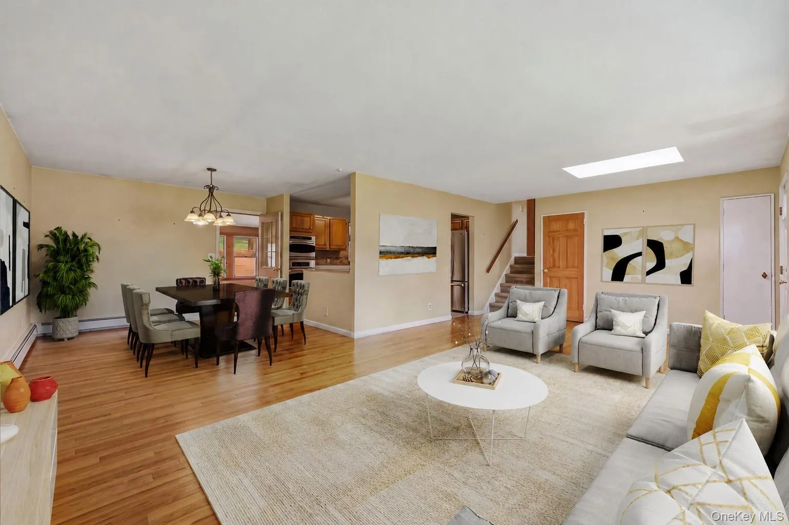 Large open space - view of living room to dining area - great for entertainment (VIRTUALLY STAGED) Large open space - view of living room to dining area - great for entertainment (VIRTUALLY STAGED)