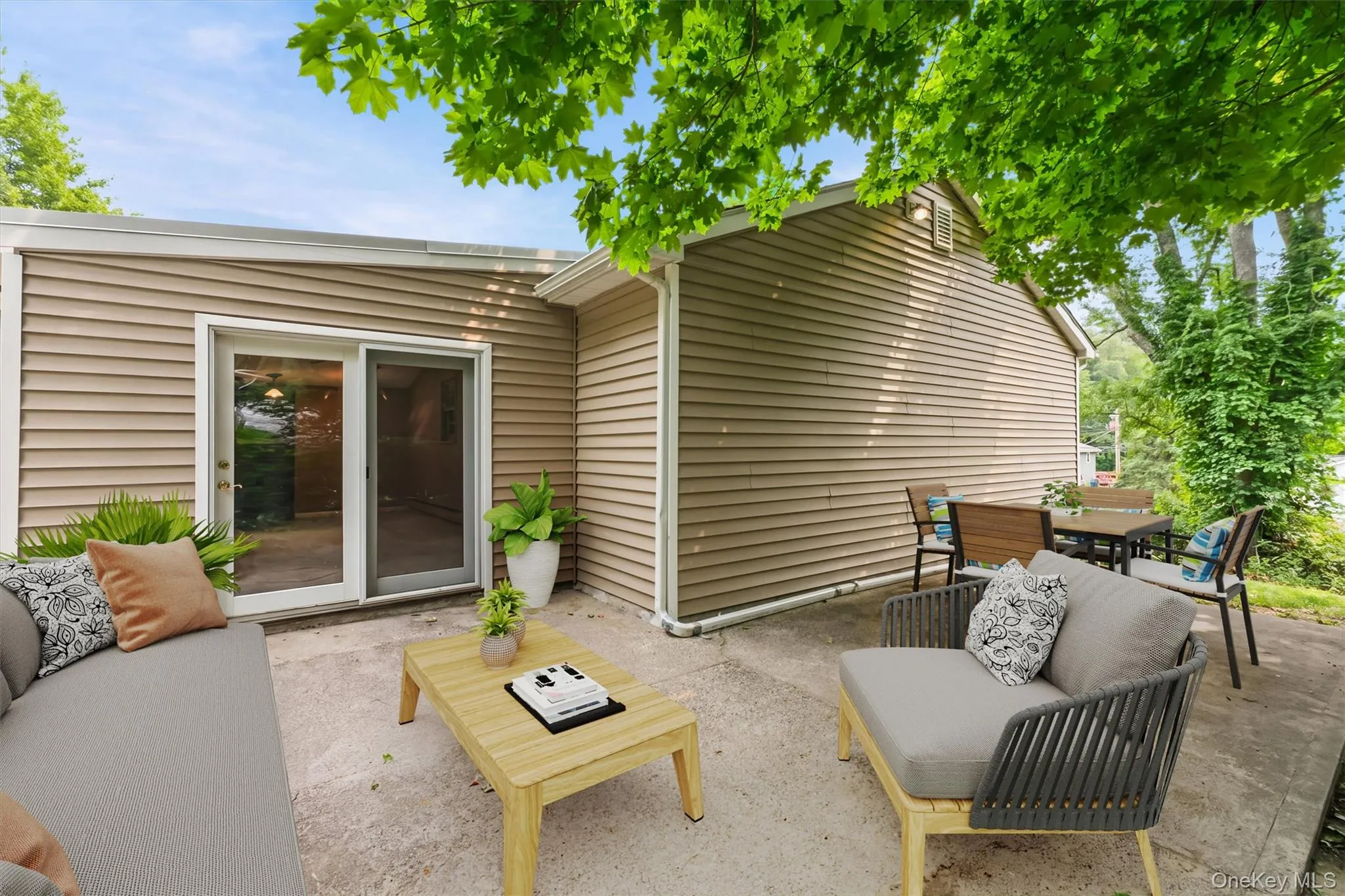 Side patio easily accessible from the great room - Home has a really good flow! Side patio easily accessible from the great room - Home has a really good flow!