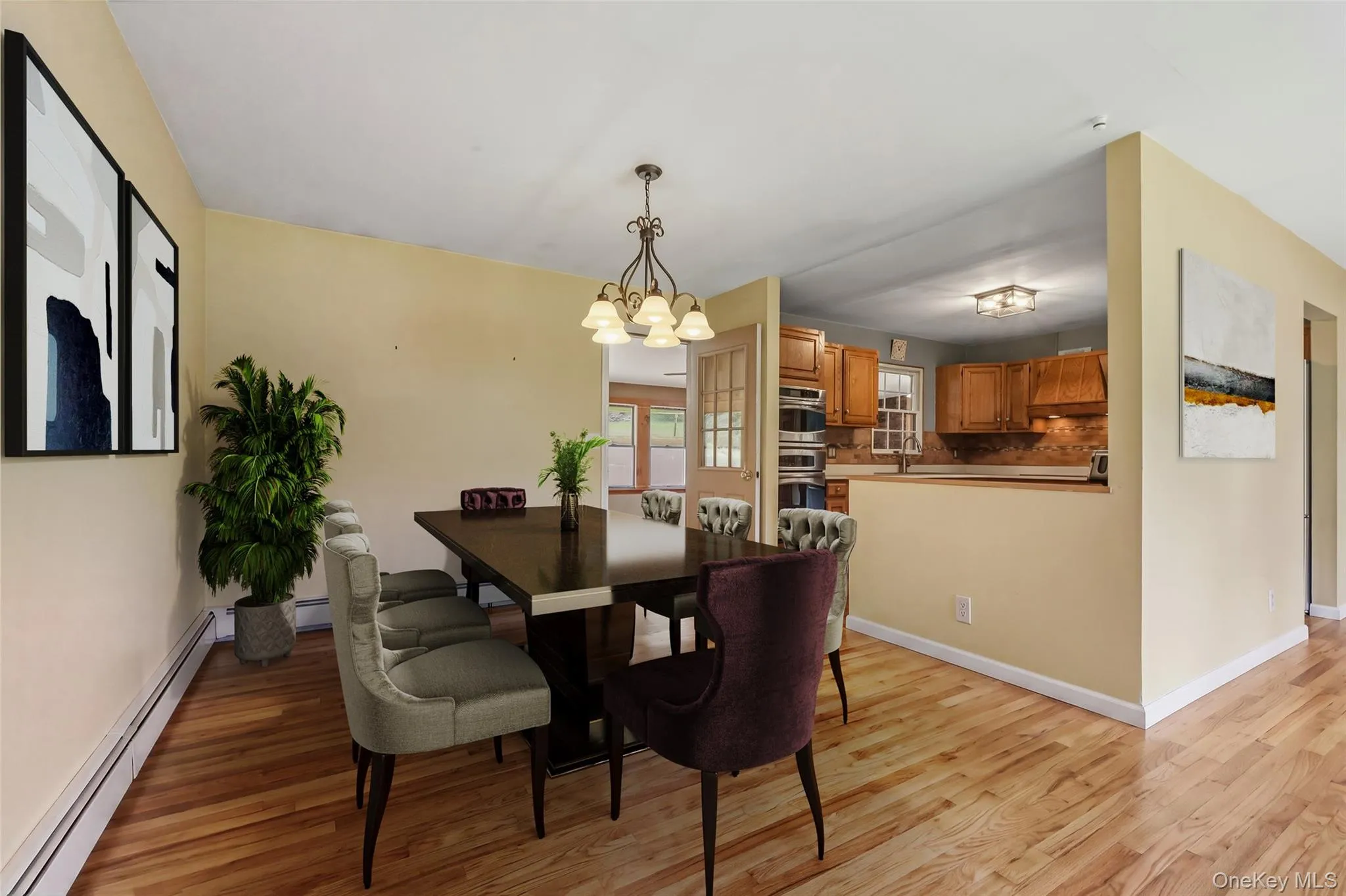 The main level is spacious with large rooms and open spaces. (VIRTUALLY STAGED) The main level is spacious with large rooms and open spaces. (VIRTUALLY STAGED)
