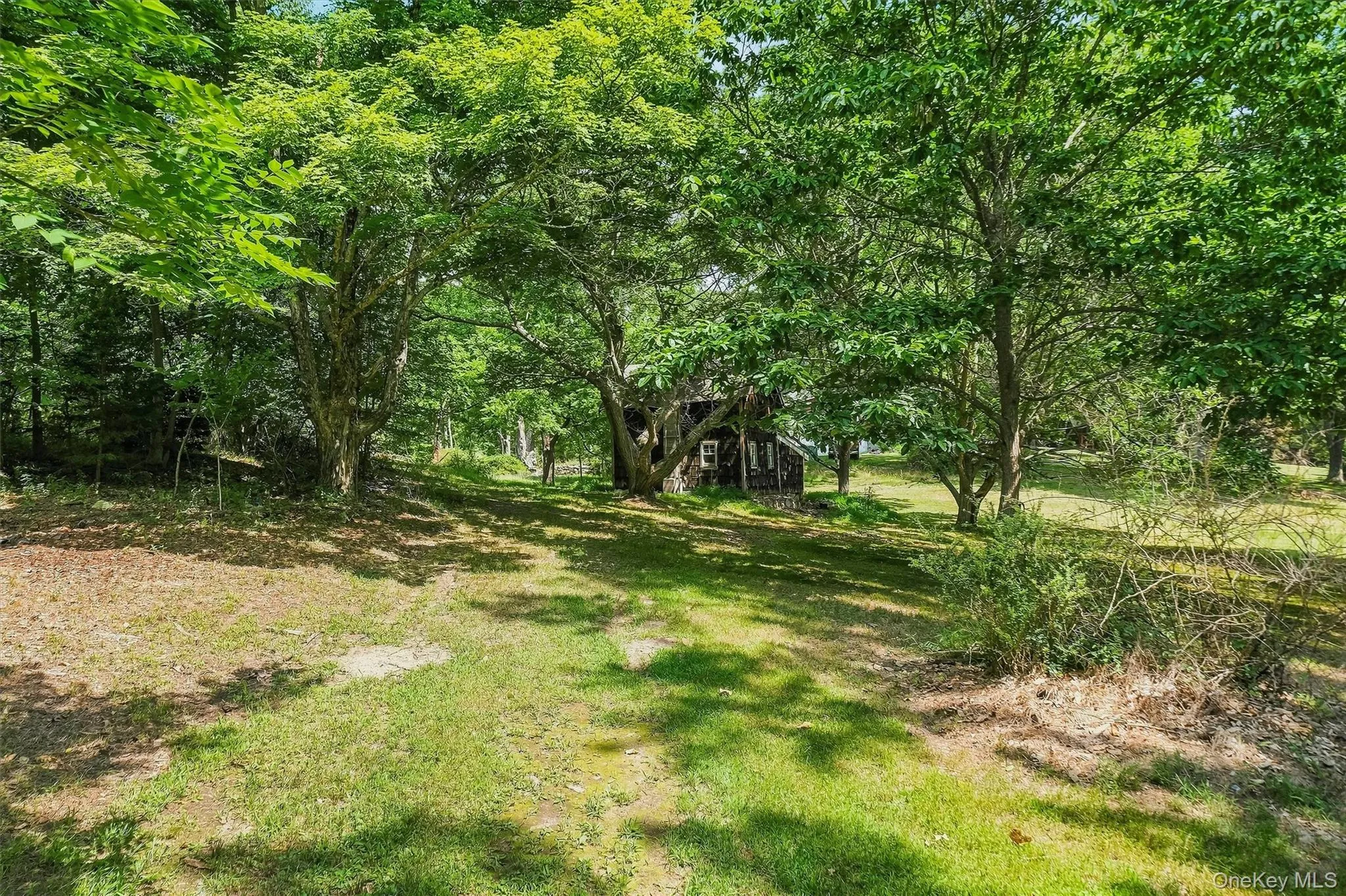An adorable outbuilding is perfect for a workshop or storage An adorable outbuilding is perfect for a workshop or storage