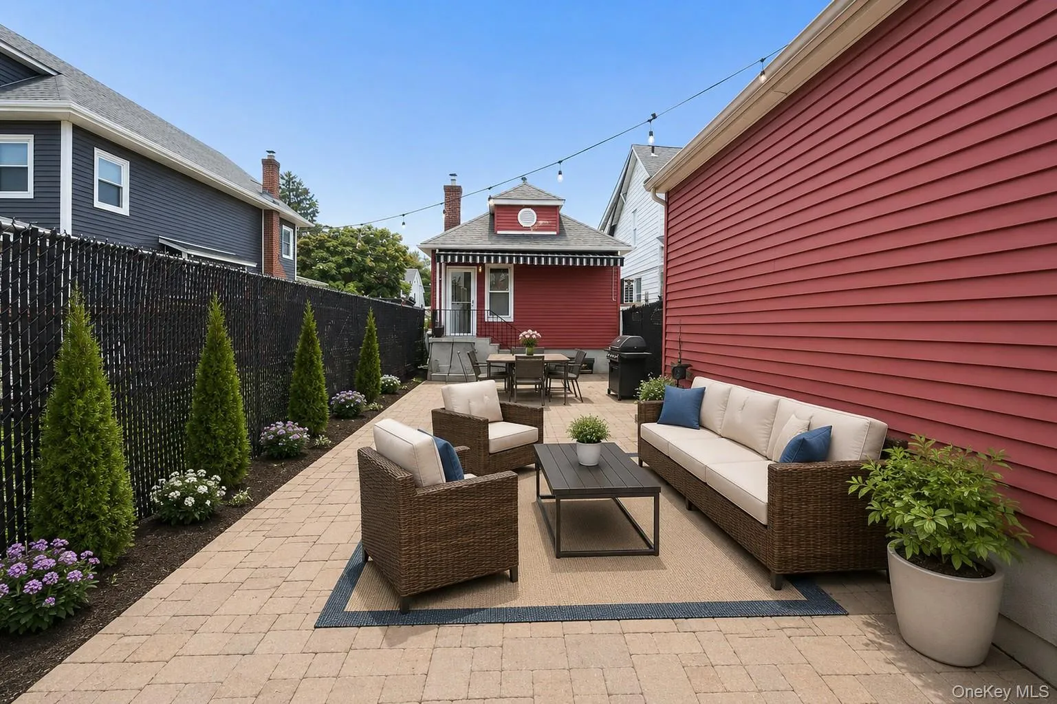Virtually staged paved patio-yard Virtually staged paved patio-yard