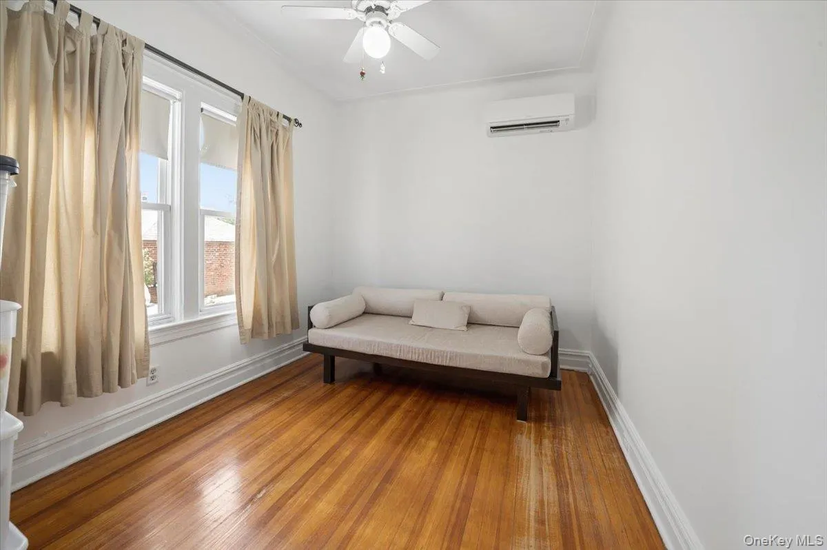 1st floor bedroom with futon, lots of sunlight 1st floor bedroom with futon, lots of sunlight