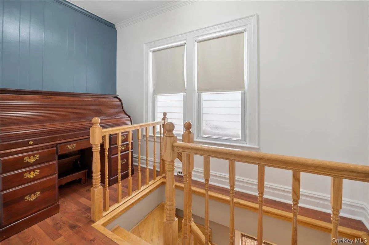Hall with stairs leading to the basement Hall with stairs leading to the basement