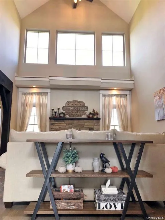 Dramatic two story great room showcases soaring ceilings that create an open, light-filled living space. Dramatic two story great room showcases soaring ceilings that create an open, light-filled living space.