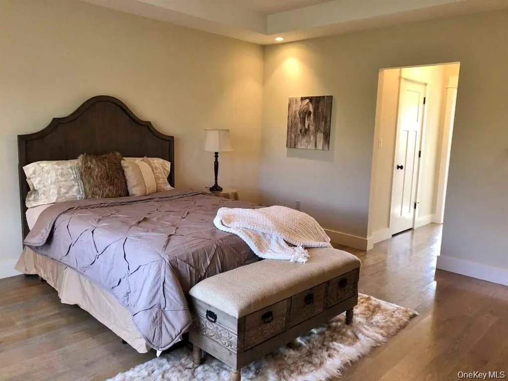 The thoughtfully arranged bedroom offers a comfortable layout with space to unwind at the end of the day. The thoughtfully arranged bedroom offers a comfortable layout with space to unwind at the end of the day.
