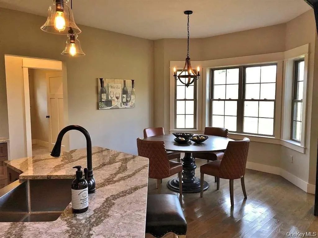 Natural light fills the dining area creating an inviting space for everyday meals and special occasions. Natural light fills the dining area creating an inviting space for everyday meals and special occasions.