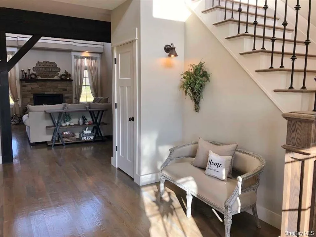 This inviting entryway provides a seamless transition into the main living spaces while offering a sense of openness and arrival. This inviting entryway provides a seamless transition into the main living spaces while offering a sense of openness and arrival.