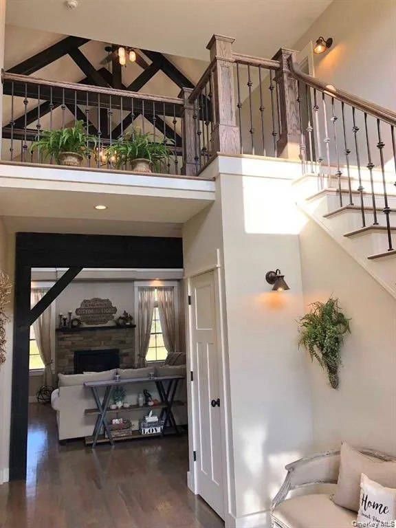 The welcoming foyer creates a memorable first impression, offering an inviting introduction to the home’s thoughtfully designed interior. The welcoming foyer creates a memorable first impression, offering an inviting introduction to the home’s thoughtfully designed interior.
