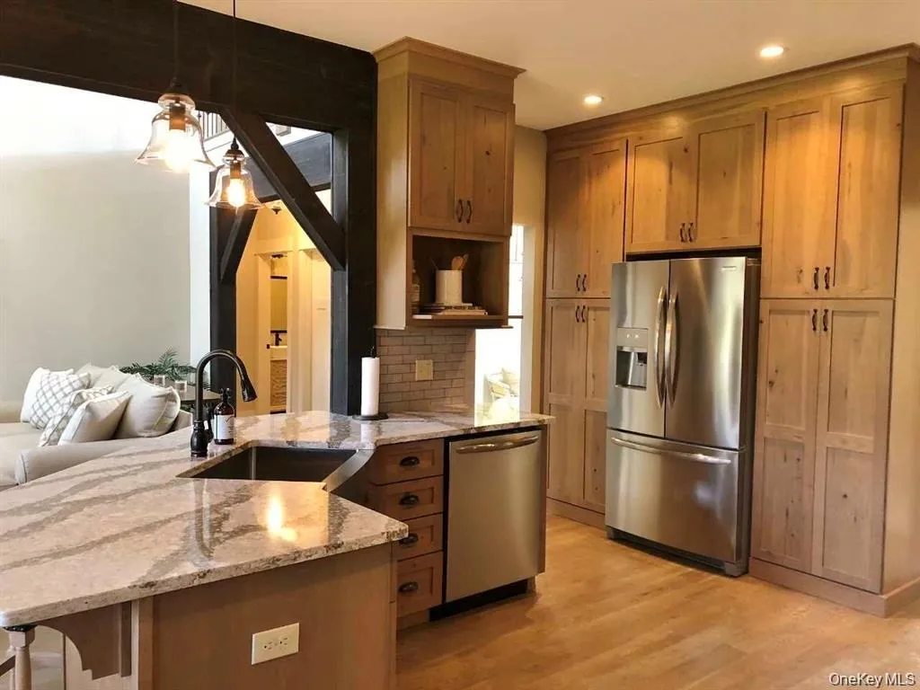 The thoughtfully designed kitchen opens naturally to the home's main living areas, creating an inviting layout that encourages connection and everyday comfort. The thoughtfully designed kitchen opens naturally to the home's main living areas, creating an inviting layout that encourages connection and everyday comfort.
