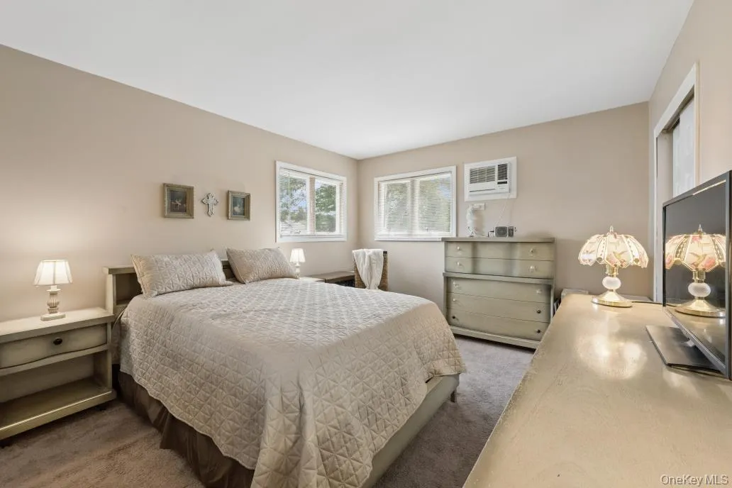 Primary bedroom w/hard wood floors under carpet Primary bedroom w/hard wood floors under carpet