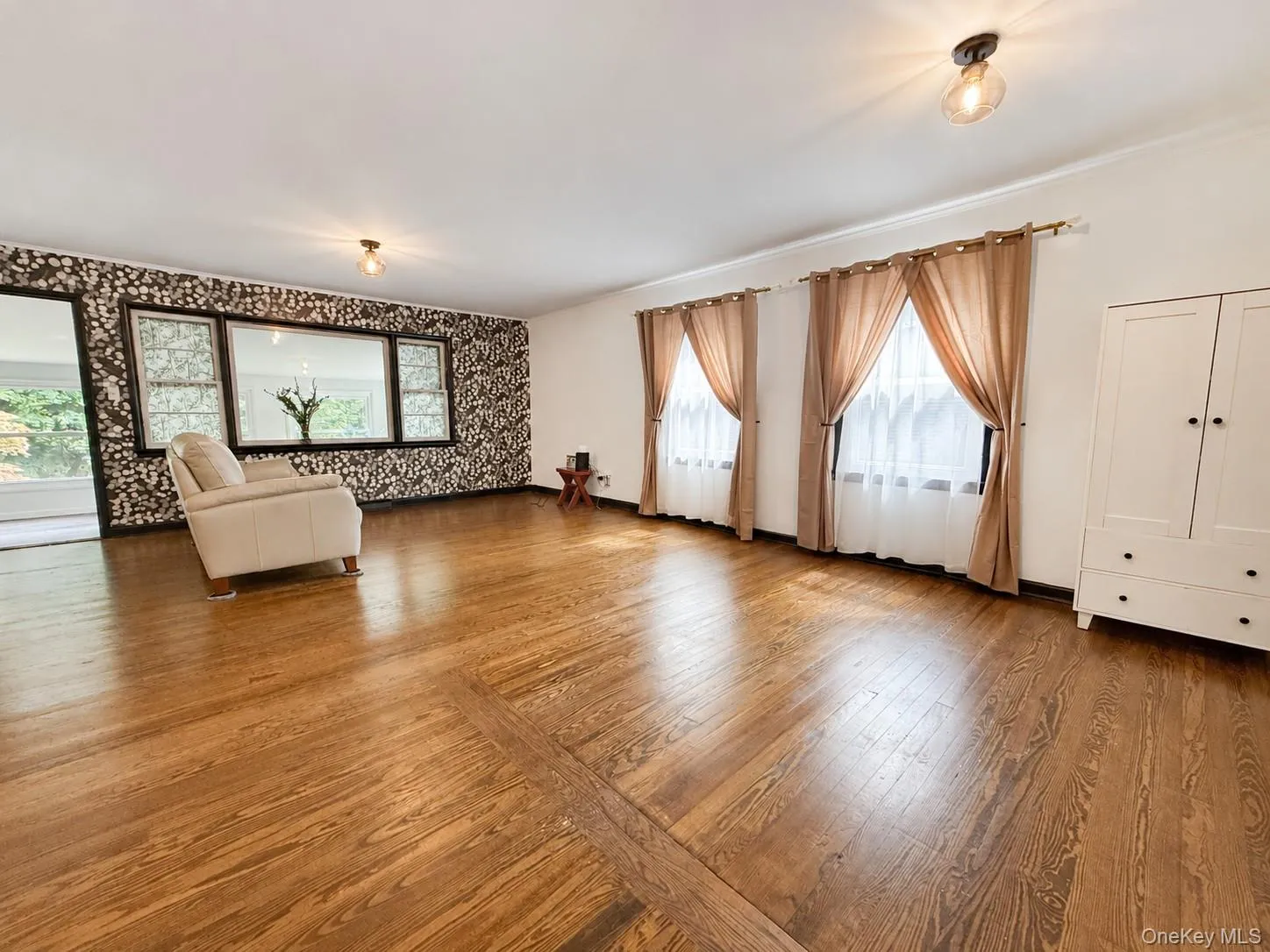 Living room leading to a 3 season room Living room leading to a 3 season room