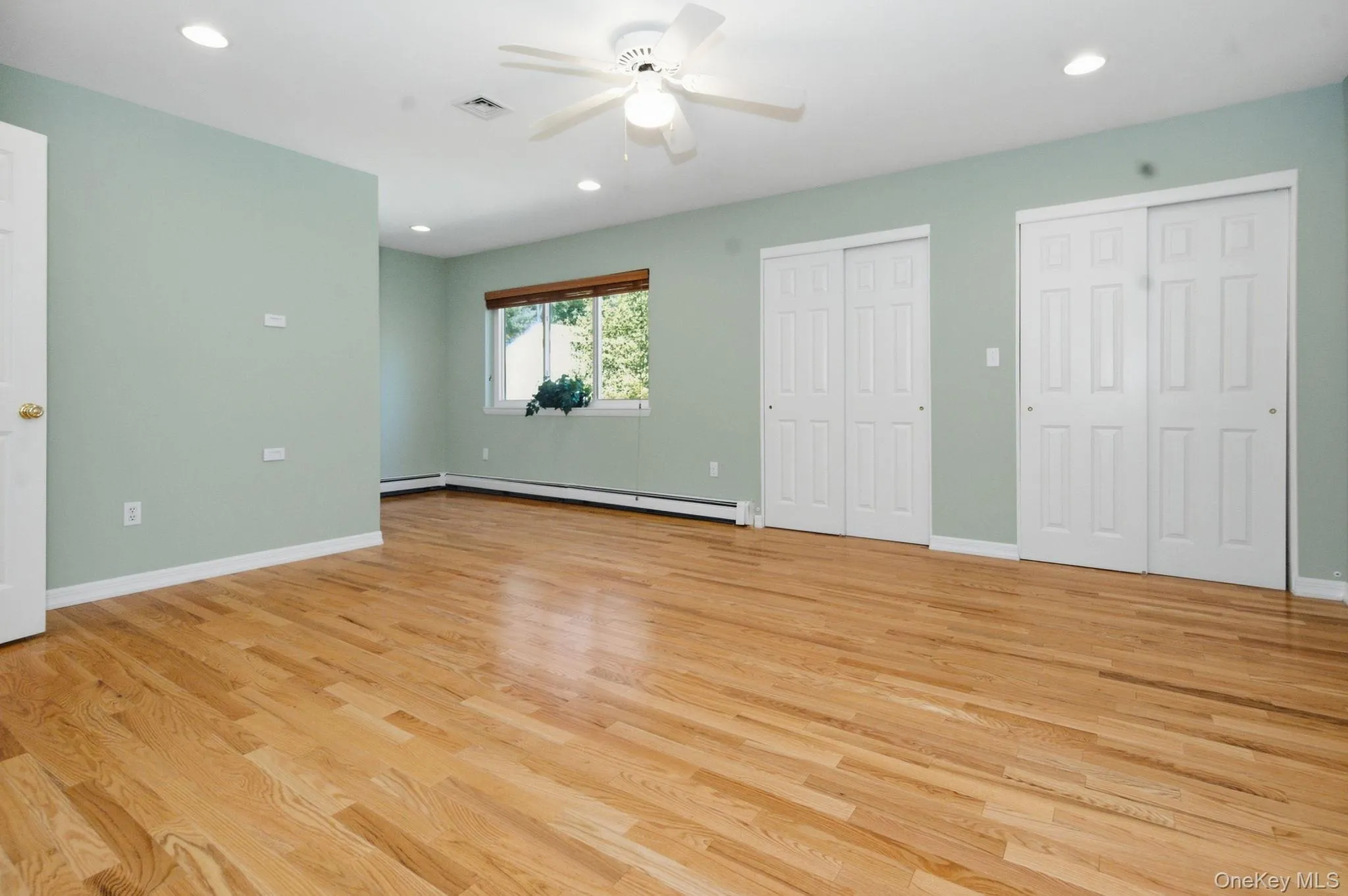Primary bedroom features multiple closets for generous storage. Primary bedroom features multiple closets for generous storage.