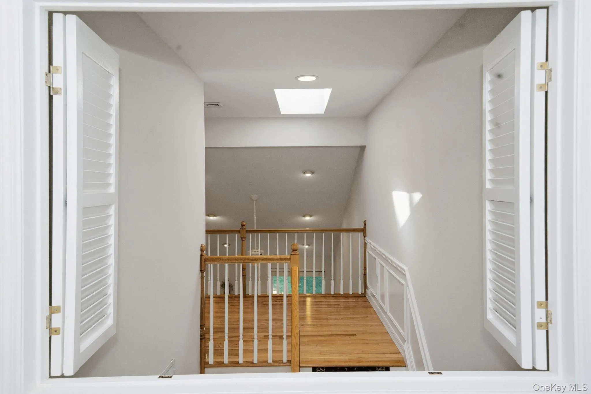 Open railing brings architectural detail to the second-floor landing and staircase. Open railing brings architectural detail to the second-floor landing and staircase.