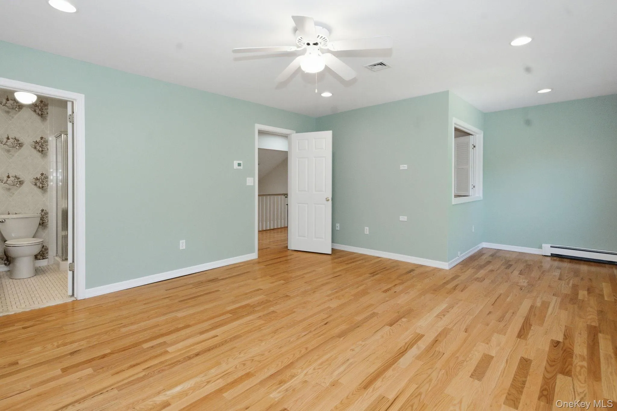Primary bedroom includes a separate sitting alcove for added flexibility. Primary bedroom includes a separate sitting alcove for added flexibility.