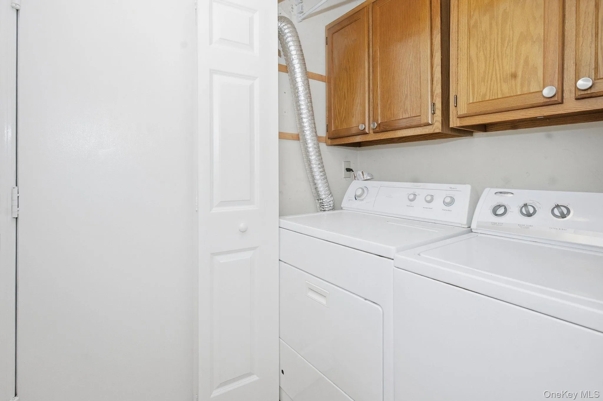 First-floor laundry is conveniently tucked just off the kitchen. First-floor laundry is conveniently tucked just off the kitchen.