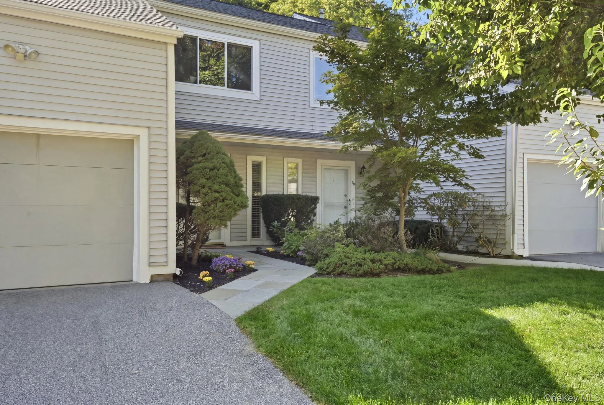 Townhouse exterior set among Canterbury Crossing’s mature landscaping. Townhouse exterior set among Canterbury Crossing’s mature landscaping.