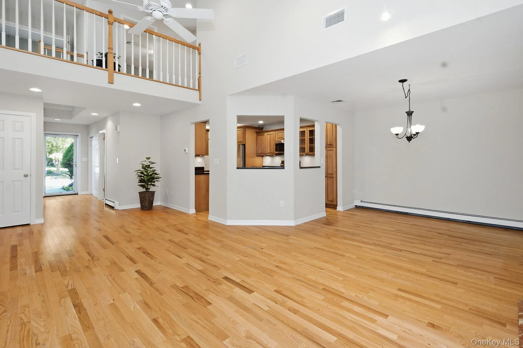 Open sightlines enhance the connection between the living and dining areas. Open sightlines enhance the connection between the living and dining areas.