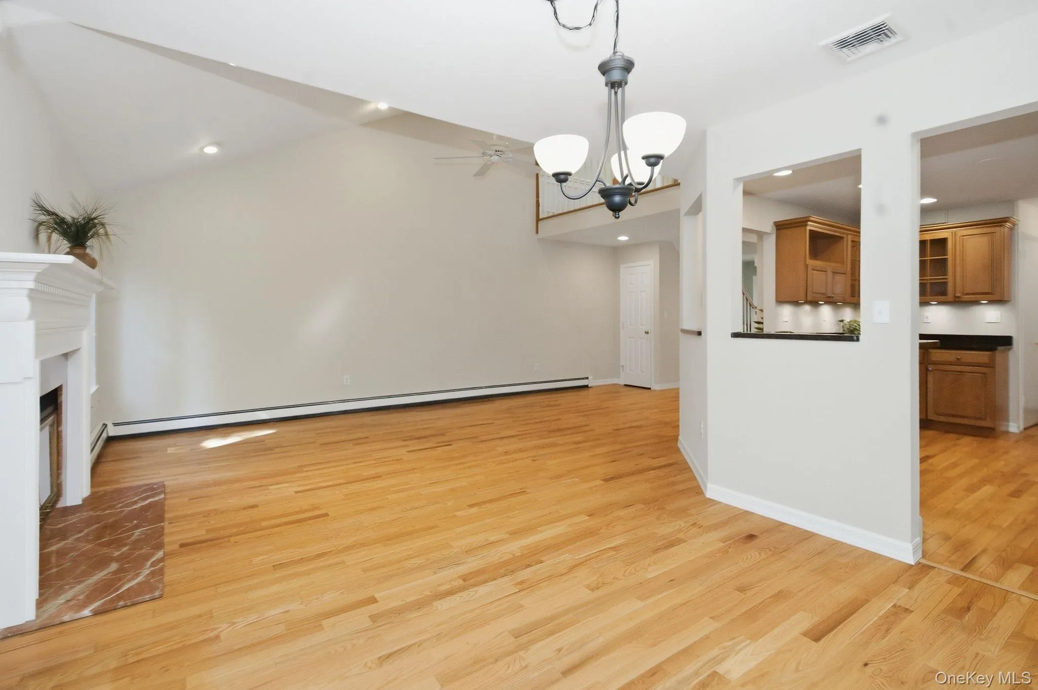 Dining area is positioned between the kitchen and living room for easy entertaining. Dining area is positioned between the kitchen and living room for easy entertaining.