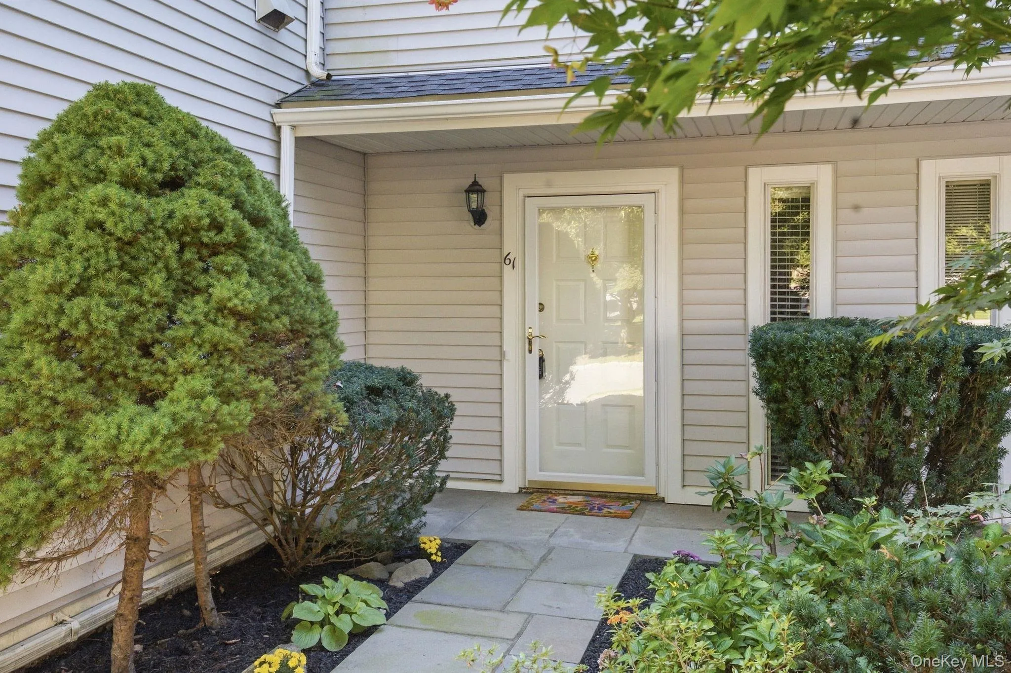 Covered front entry provides a sheltered transition into the home. Covered front entry provides a sheltered transition into the home.