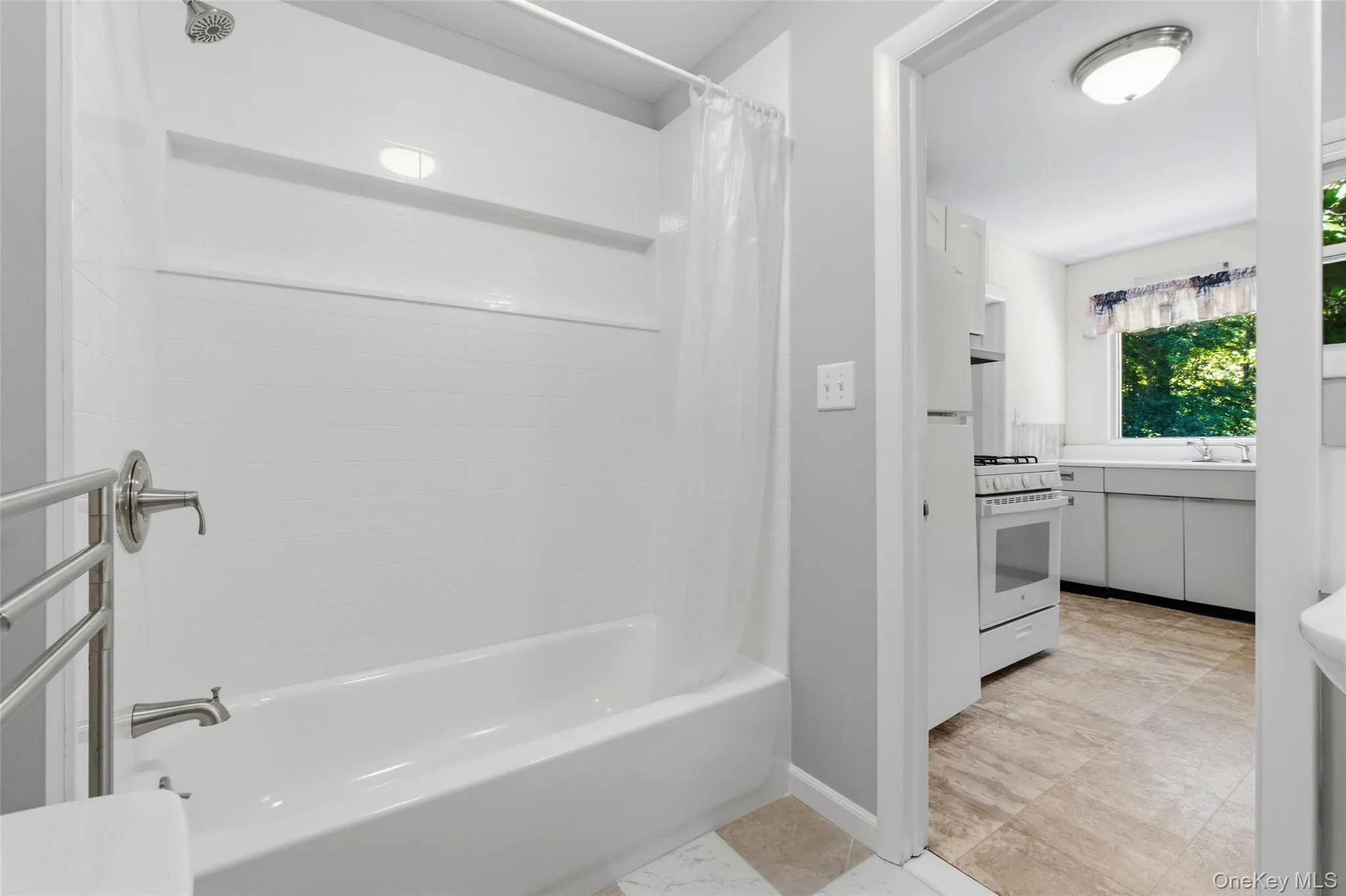 Fully Renovated Full Bathroom with combined Tub and Shower. Fully Renovated Full Bathroom with combined Tub and Shower.