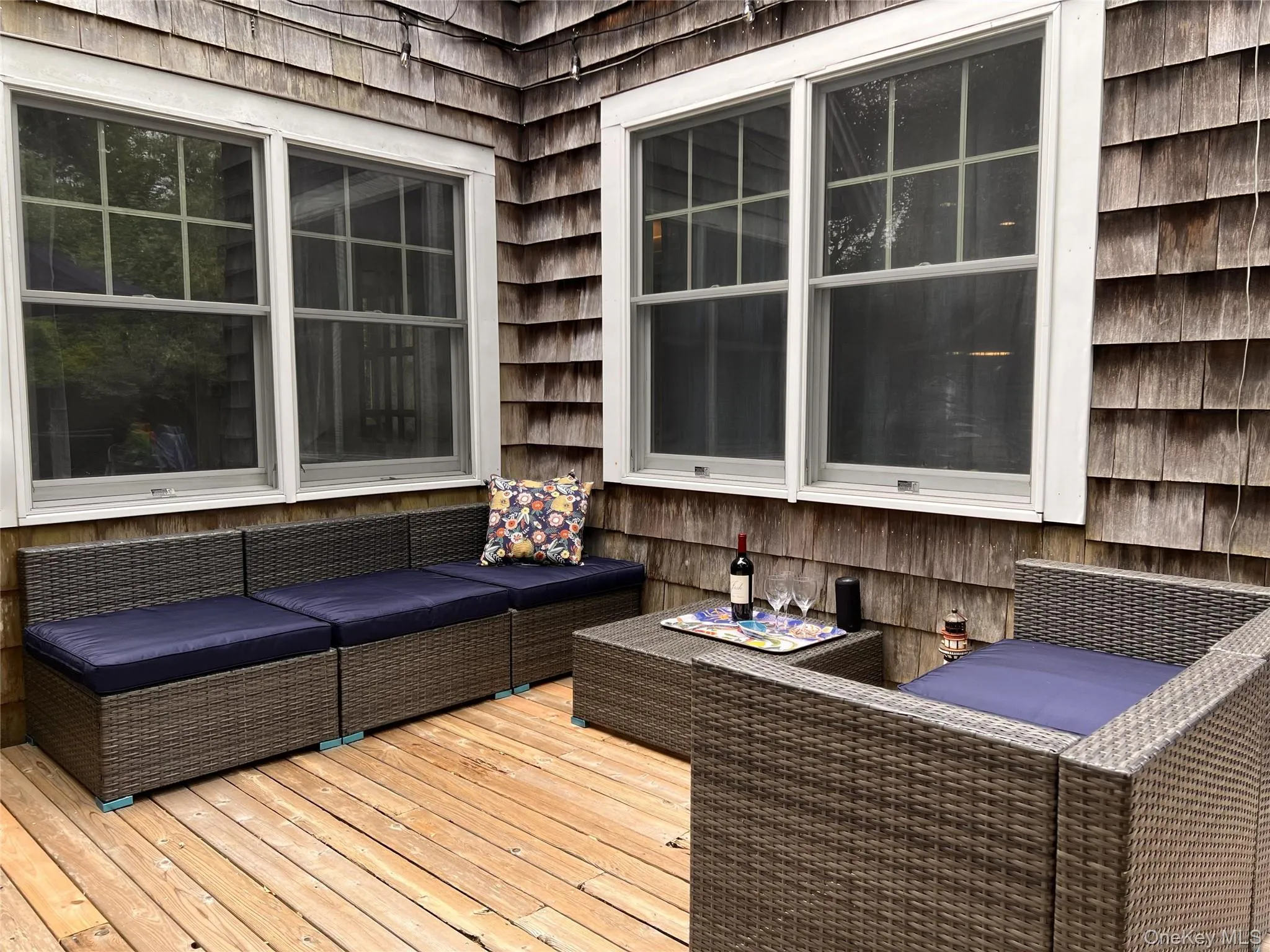 Wooden deck featuring outdoor lounge area Wooden deck featuring outdoor lounge area