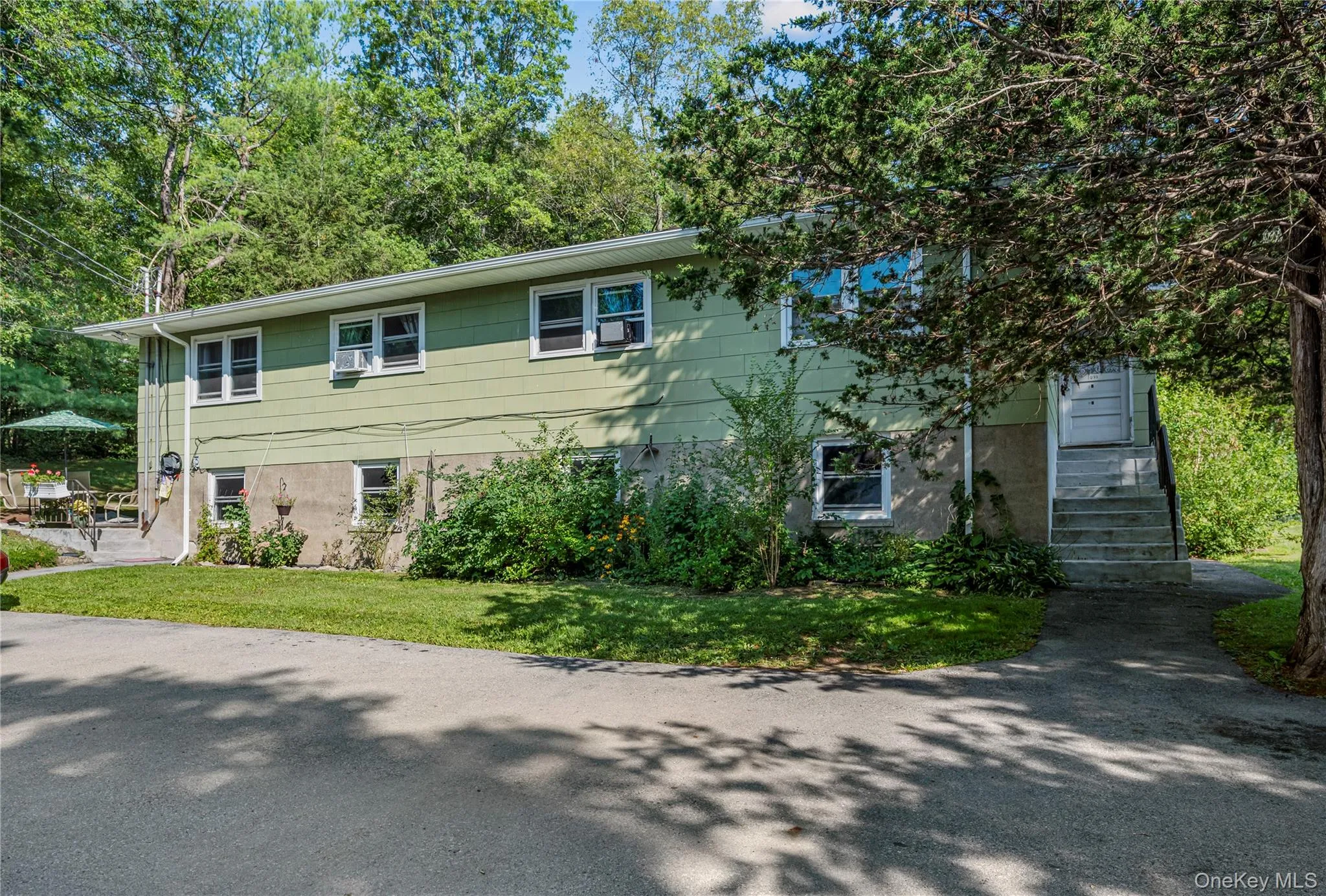 View of front of property featuring a front lawn View of front of property featuring a front lawn