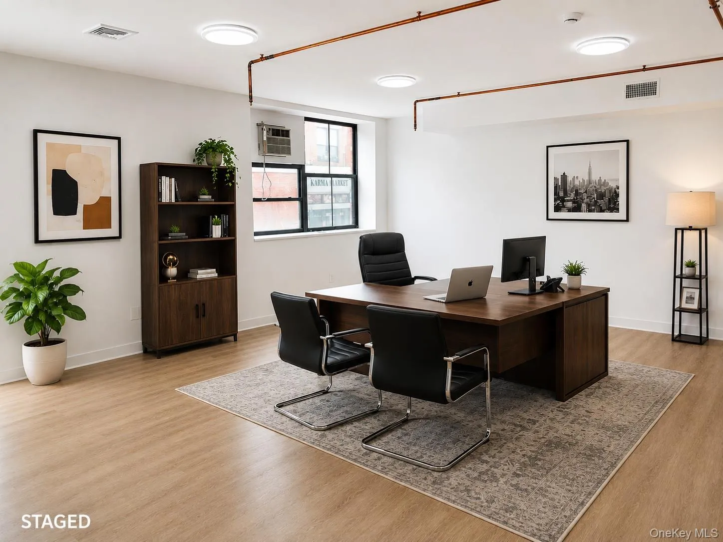 Light wood-finish flooring with white baseboards throughout Light wood-finish flooring with white baseboards throughout