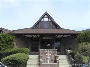 View of front of house featuring stairway and covered porch View of front of house featuring stairway and covered porch