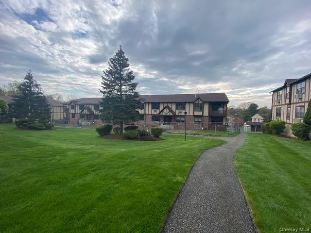 View of home's community with a lawn and a residential view View of home's community with a lawn and a residential view