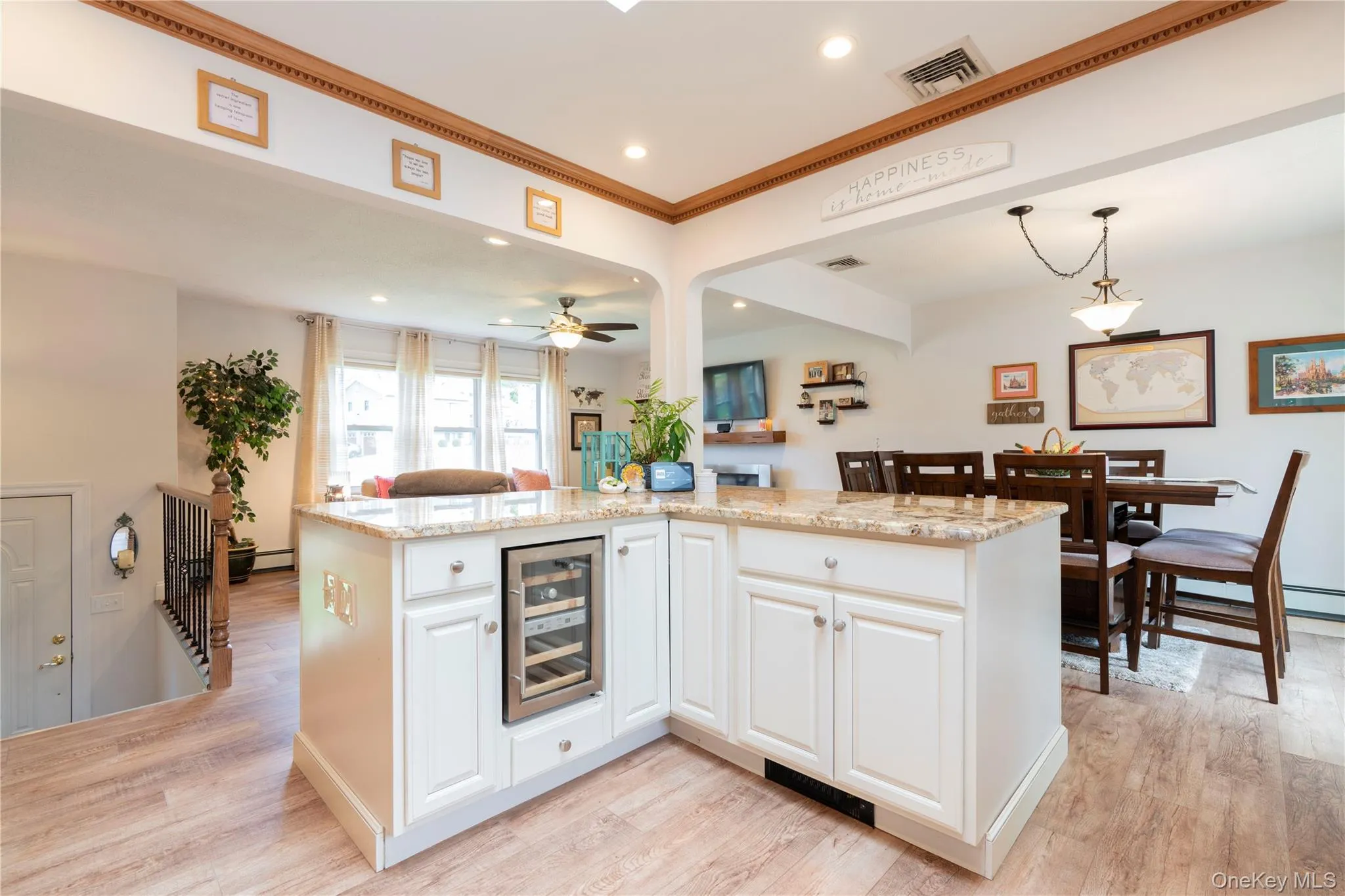 Kitchen has gorgeousquartz countertop on a beautiful L shaped island w storage Kitchen has gorgeousquartz countertop on a beautiful L shaped island w storage