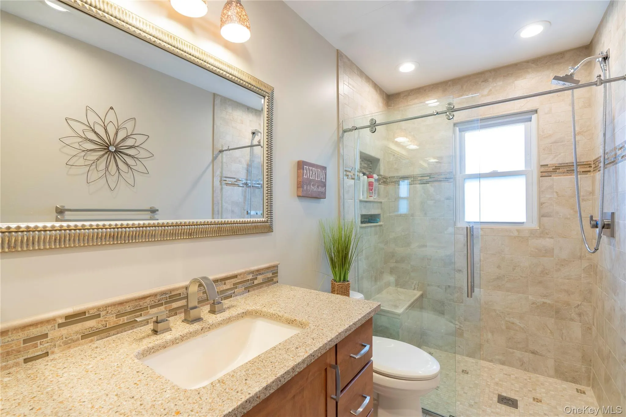 Main floor full Bath with glass enclosed shower Main floor full Bath with glass enclosed shower