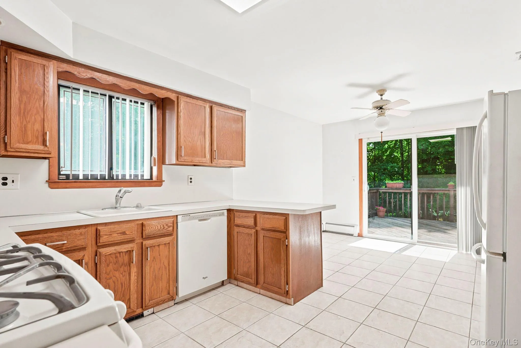 Access to deck for outdoor activities and entertaining ease. Access to deck for outdoor activities and entertaining ease.