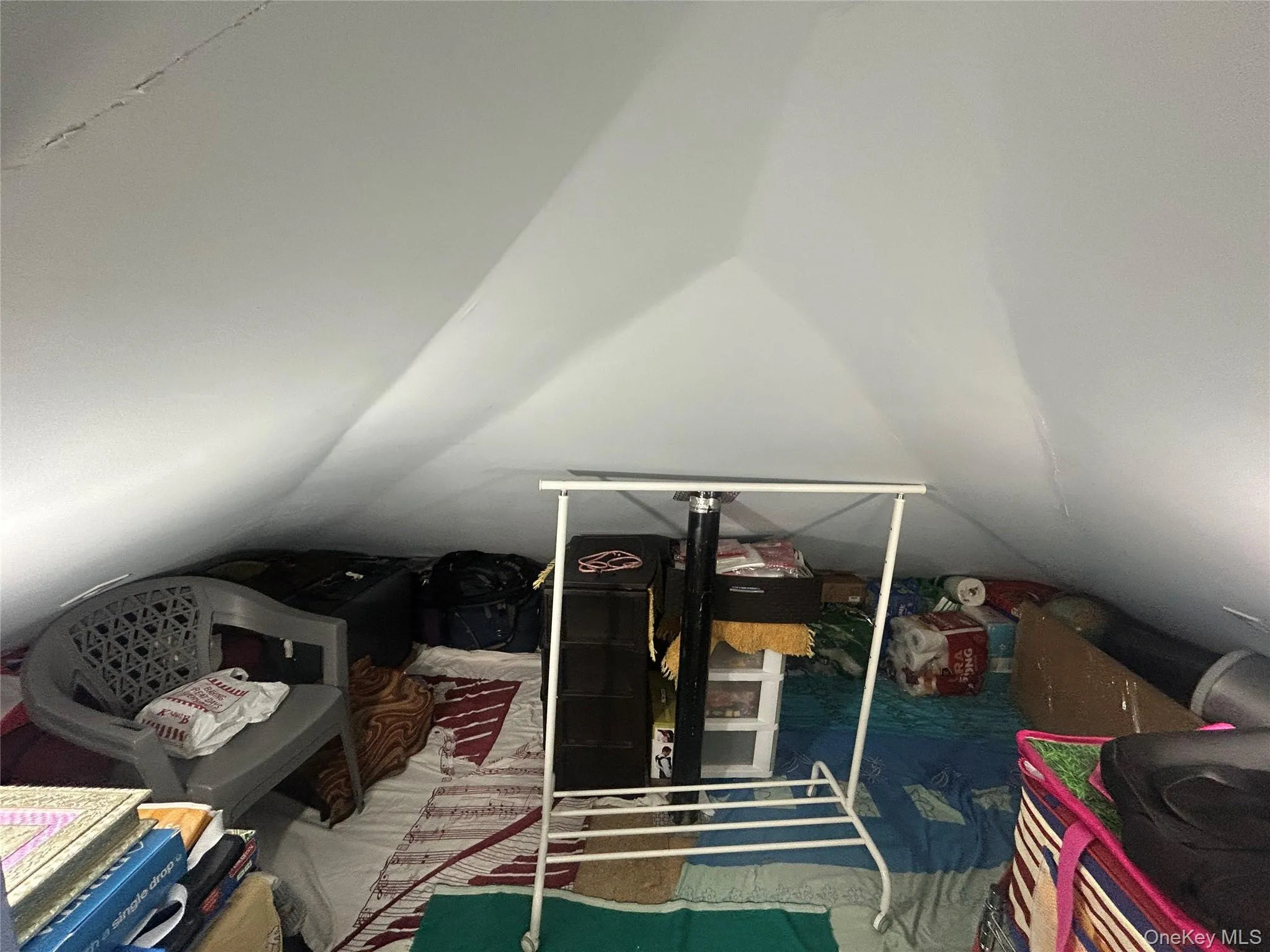 Additional storage area in attic. Additional storage area in attic.