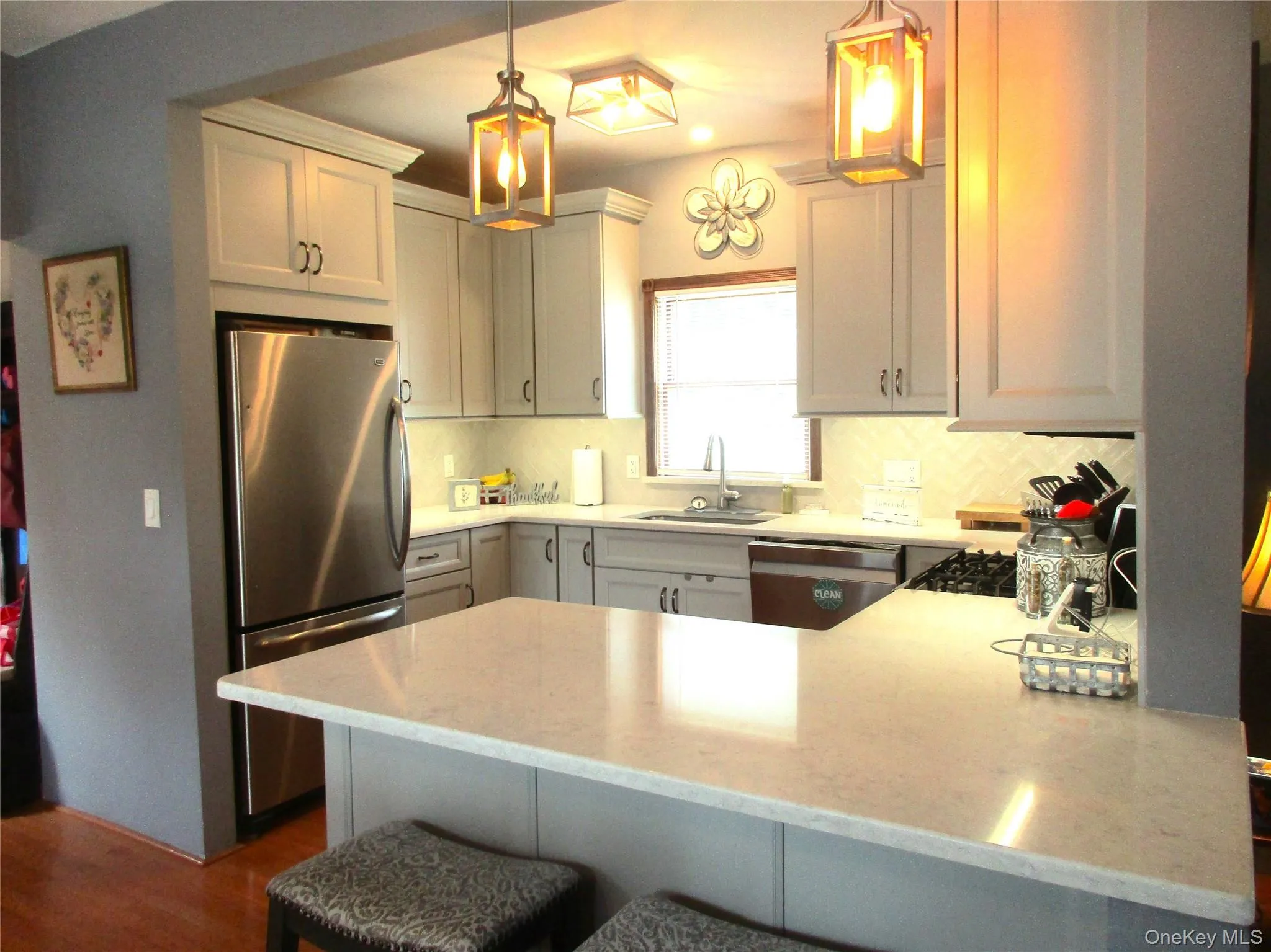Large Island to enjoy meals at- view from dining room side Large Island to enjoy meals at- view from dining room side