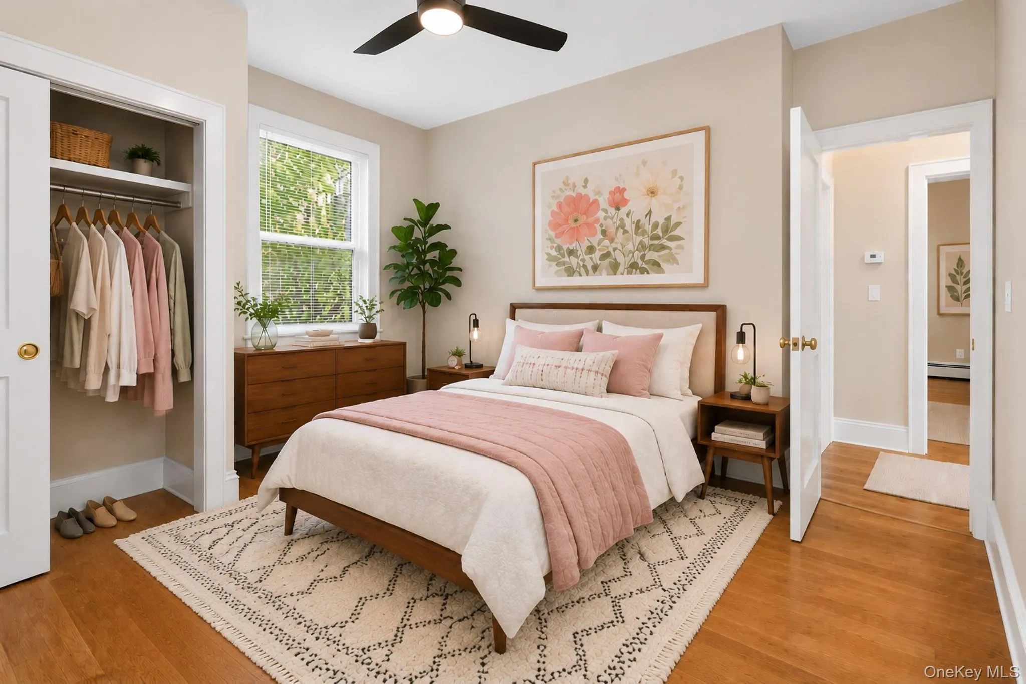 The second bedroom is a cozy space with plenty of natural light, storage, and can also be used as an office. The second bedroom is a cozy space with plenty of natural light, storage, and can also be used as an office.