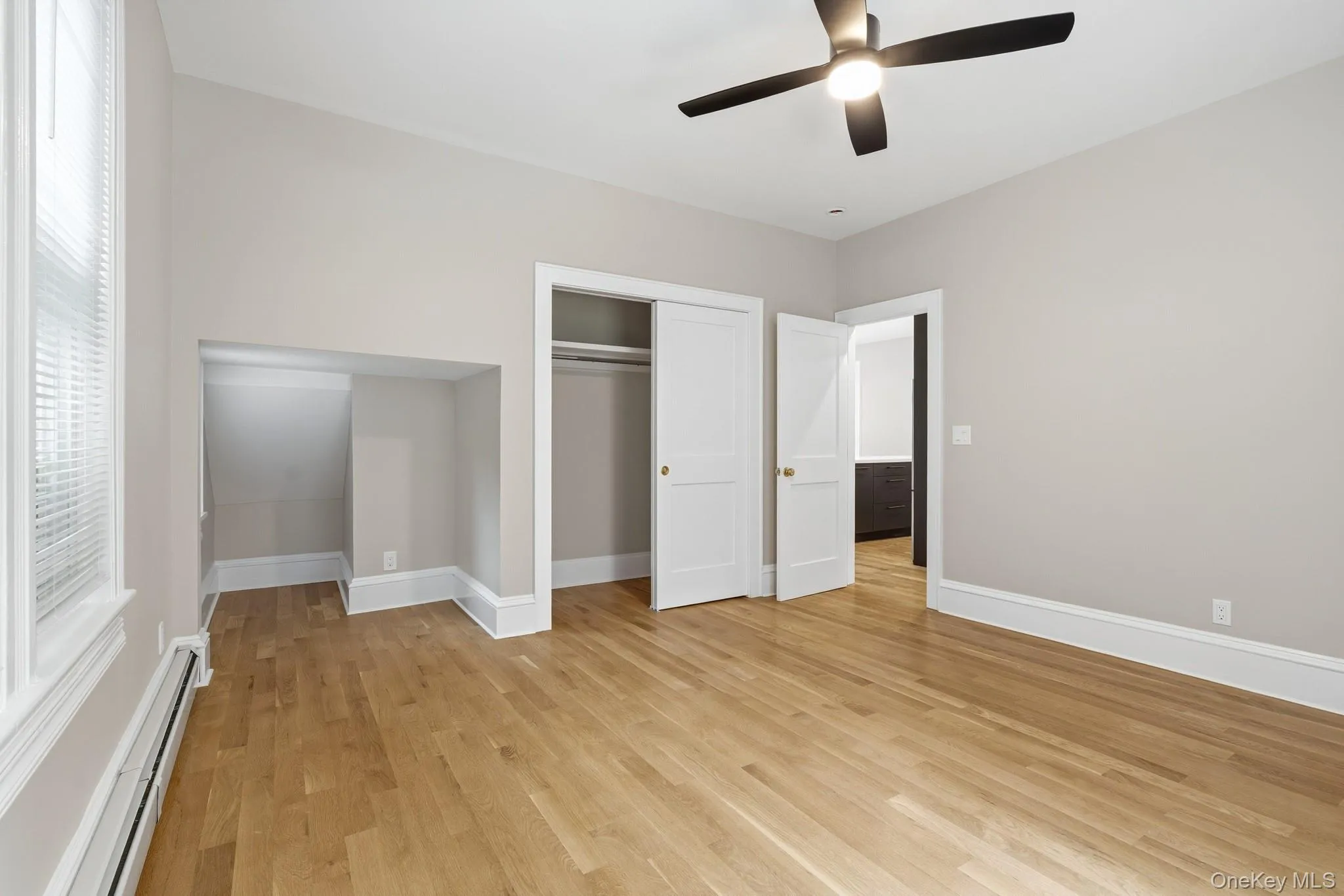 The stunning main bedroom has plenty of space for all your needs. The stunning main bedroom has plenty of space for all your needs.