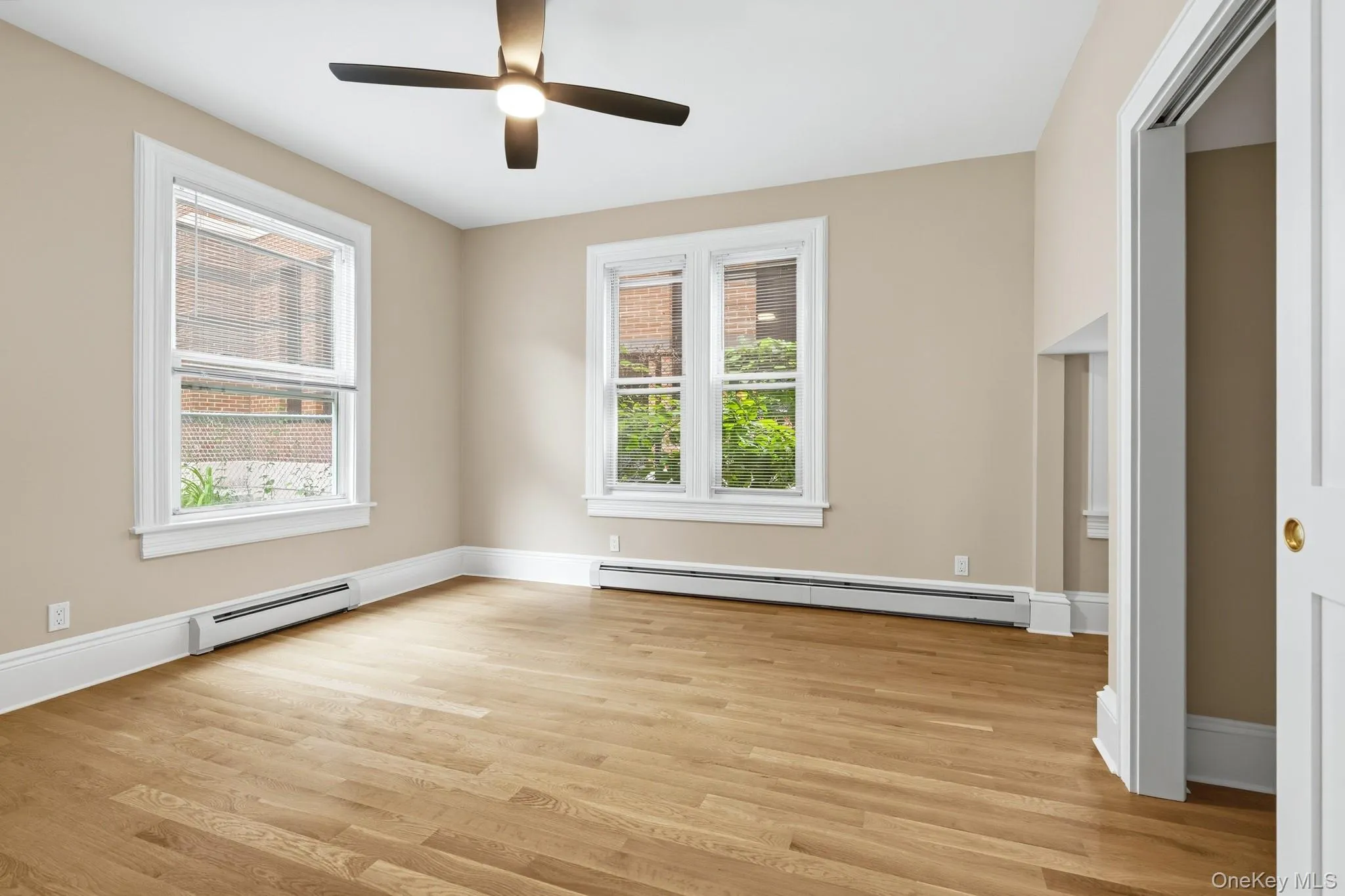 The stunning main bedroom has plenty of space for all your needs. The stunning main bedroom has plenty of space for all your needs.