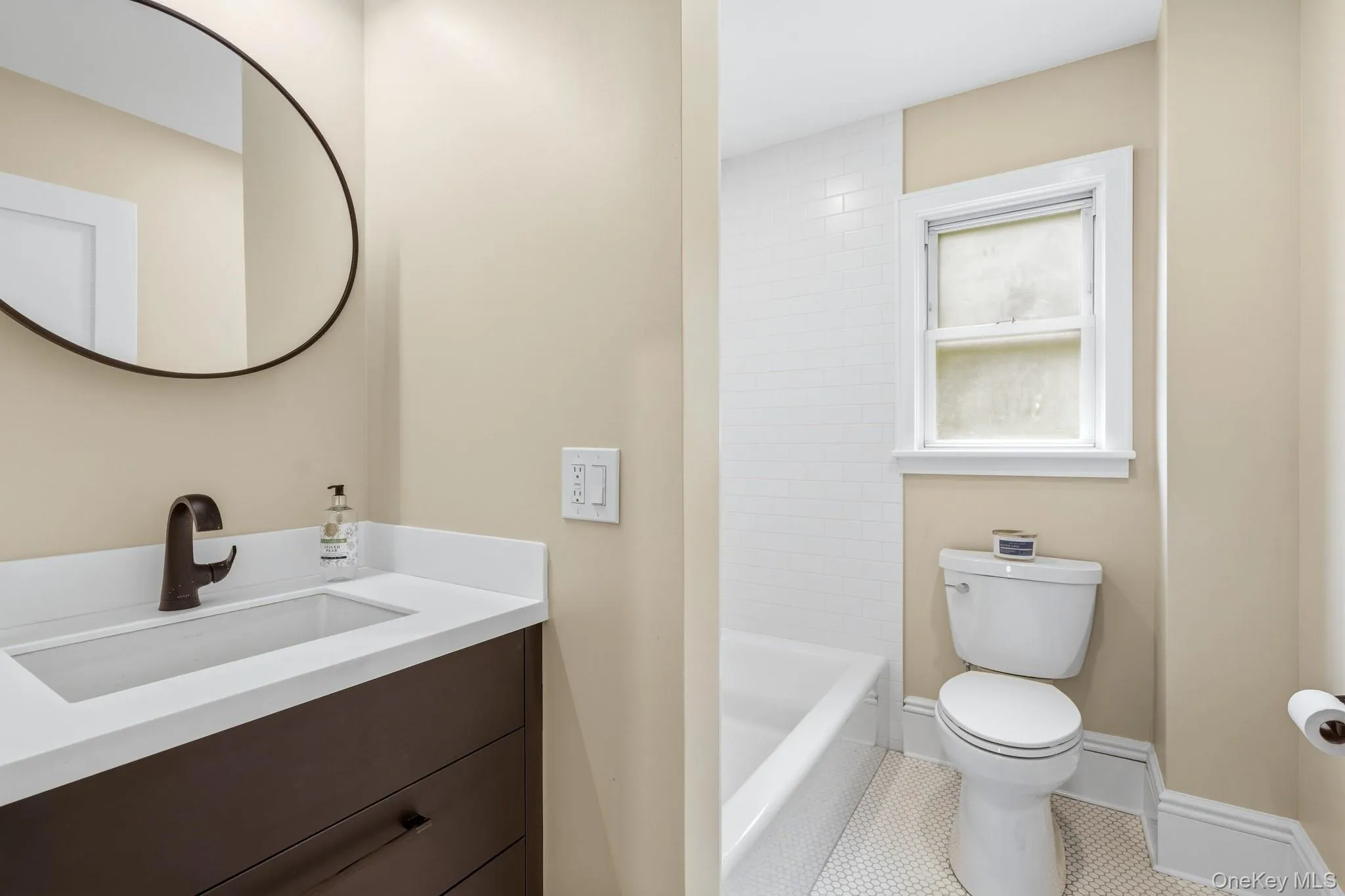 The bathroom sits between the two bedrooms and features natural light as well as beautiful lighting. The designer tiling on the brand new bathroom sparkles in your new oasis. It's all in the details! The bathroom sits between the two bedrooms and features natural light as well as beautiful lighting. The designer tiling on the brand new bathroom sparkles in your new oasis. It's all in the details!