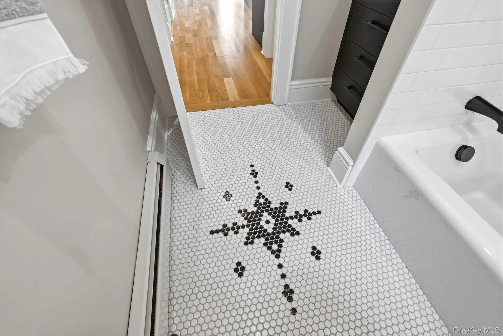 The designer tiling on the brand new bathroom sparkle in your new oasis. It's all in the details! The designer tiling on the brand new bathroom sparkle in your new oasis. It's all in the details!