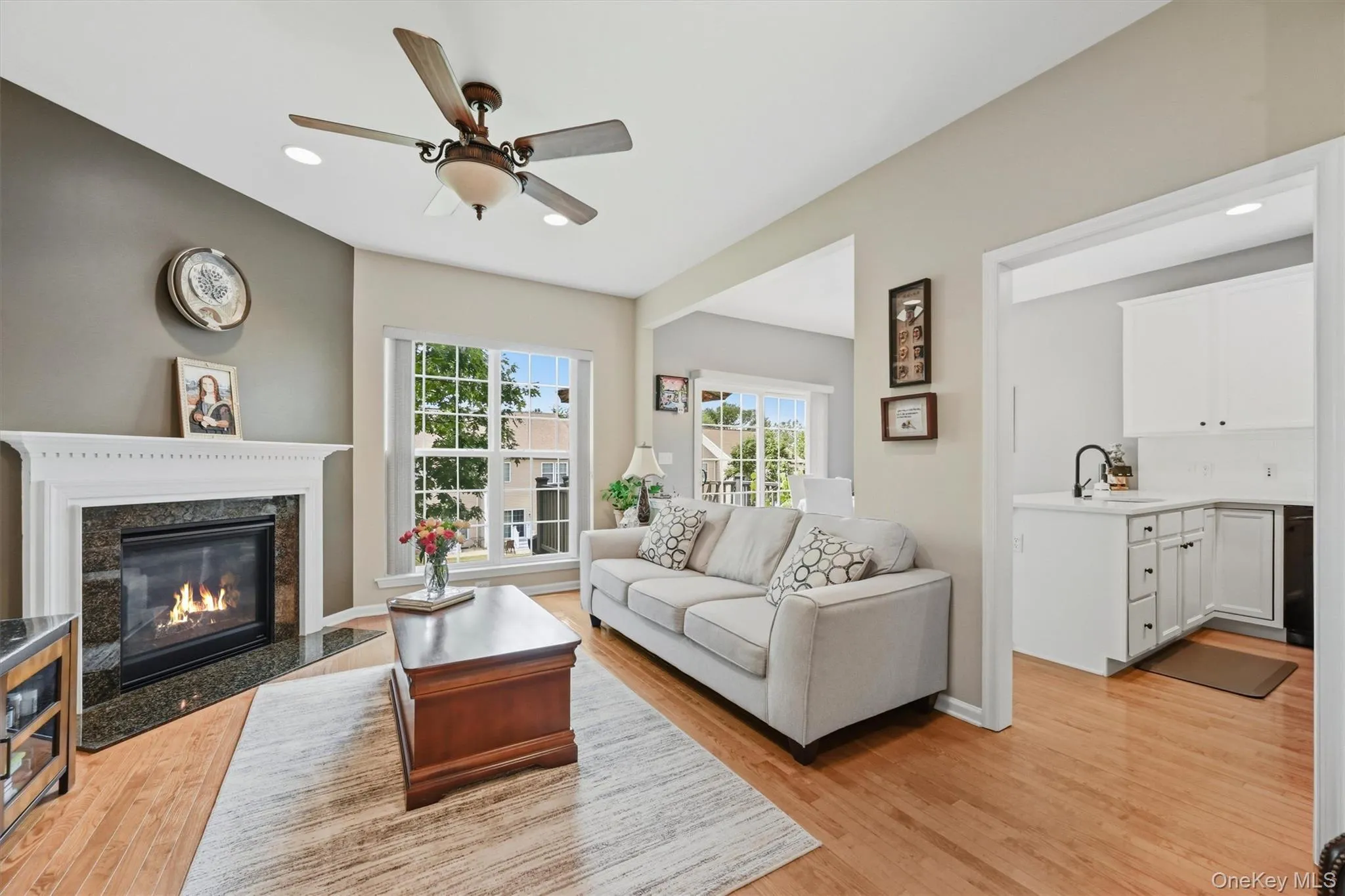 The gas fireplace is great for chilly nights. Look at all the windows!. The gas fireplace is great for chilly nights. Look at all the windows!.
