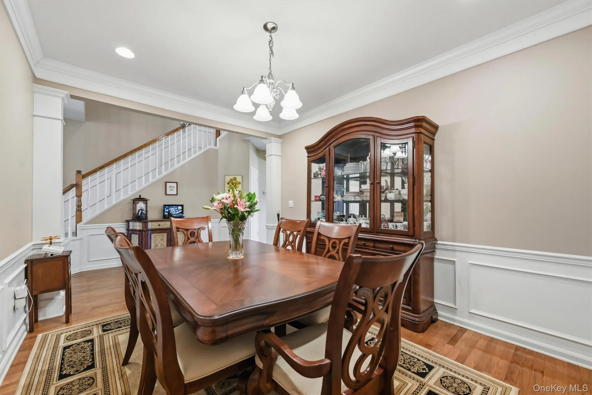 The formal dining room with it's crown and base molding can easily fit all your dinner guests. The formal dining room with it's crown and base molding can easily fit all your dinner guests.