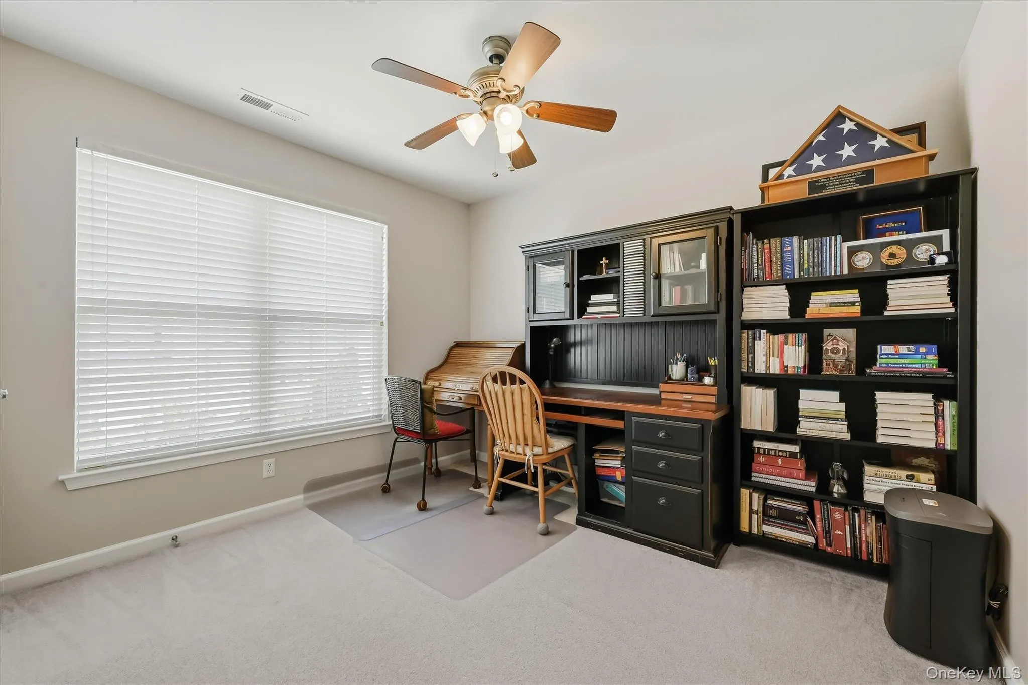 This third bedroom is currently used as a home office. The closet is behind us. This third bedroom is currently used as a home office. The closet is behind us.